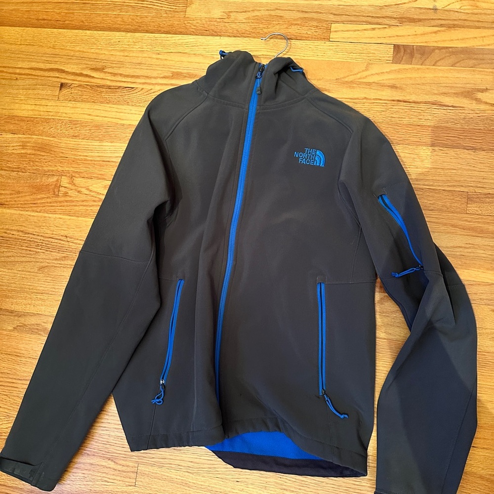 The North Face Men's Black Jacket with Blue Accents